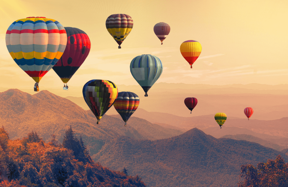 50+Adventure Ideas Midlife Women Bright Coloured Hot Air Balloons in the Sky