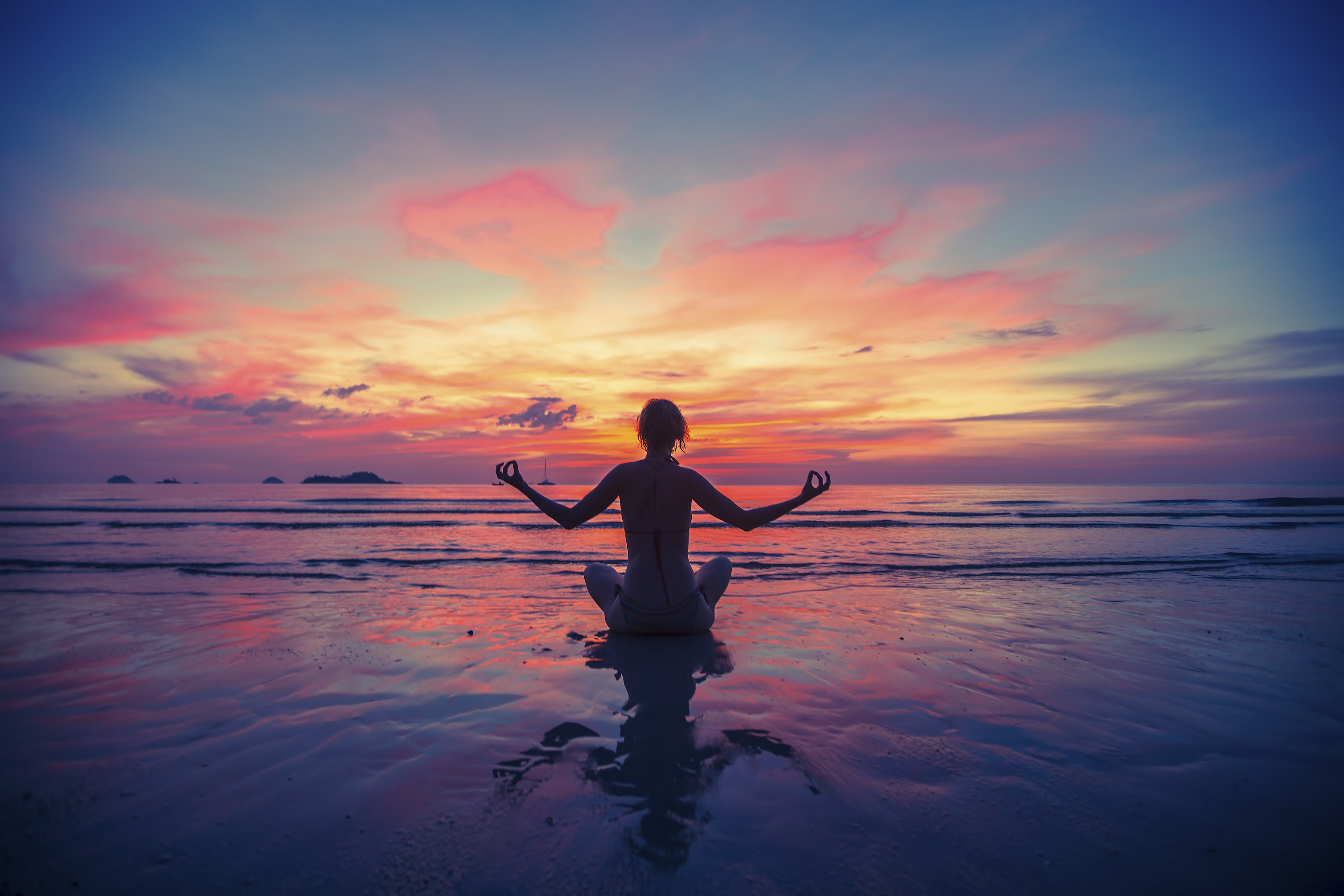 Woman doing meditation near the ocean beach. Yoga silhouette. * Alisoun  Mackenzie